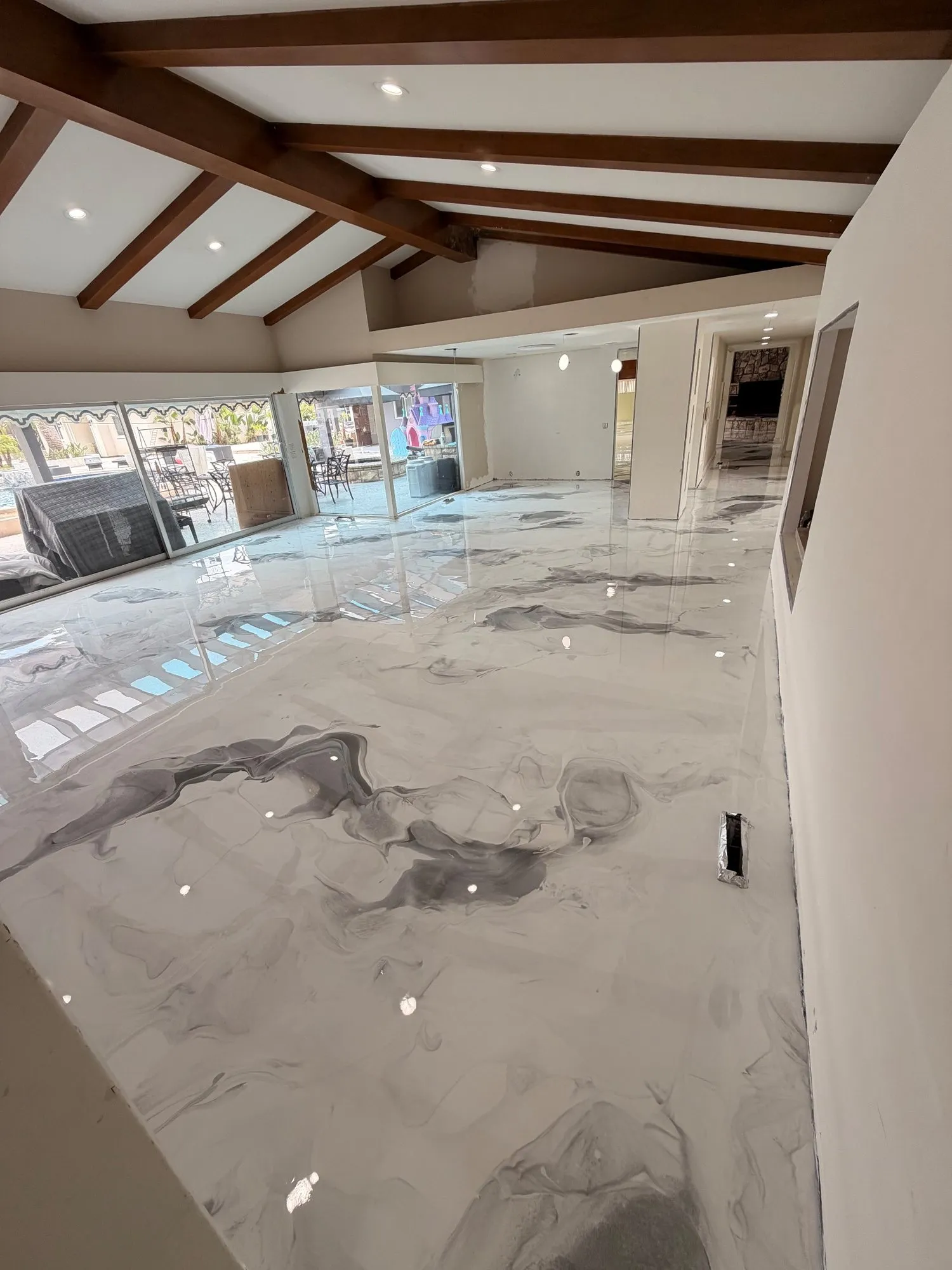 Commercial metallic epoxy floor in Garden Grove, photo 1