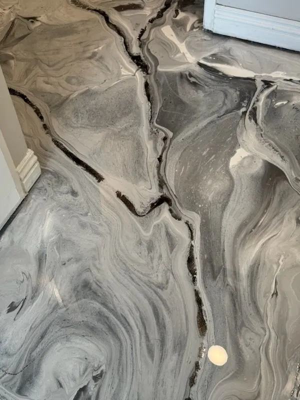 Black and white metallic epoxy floors in San Diego
