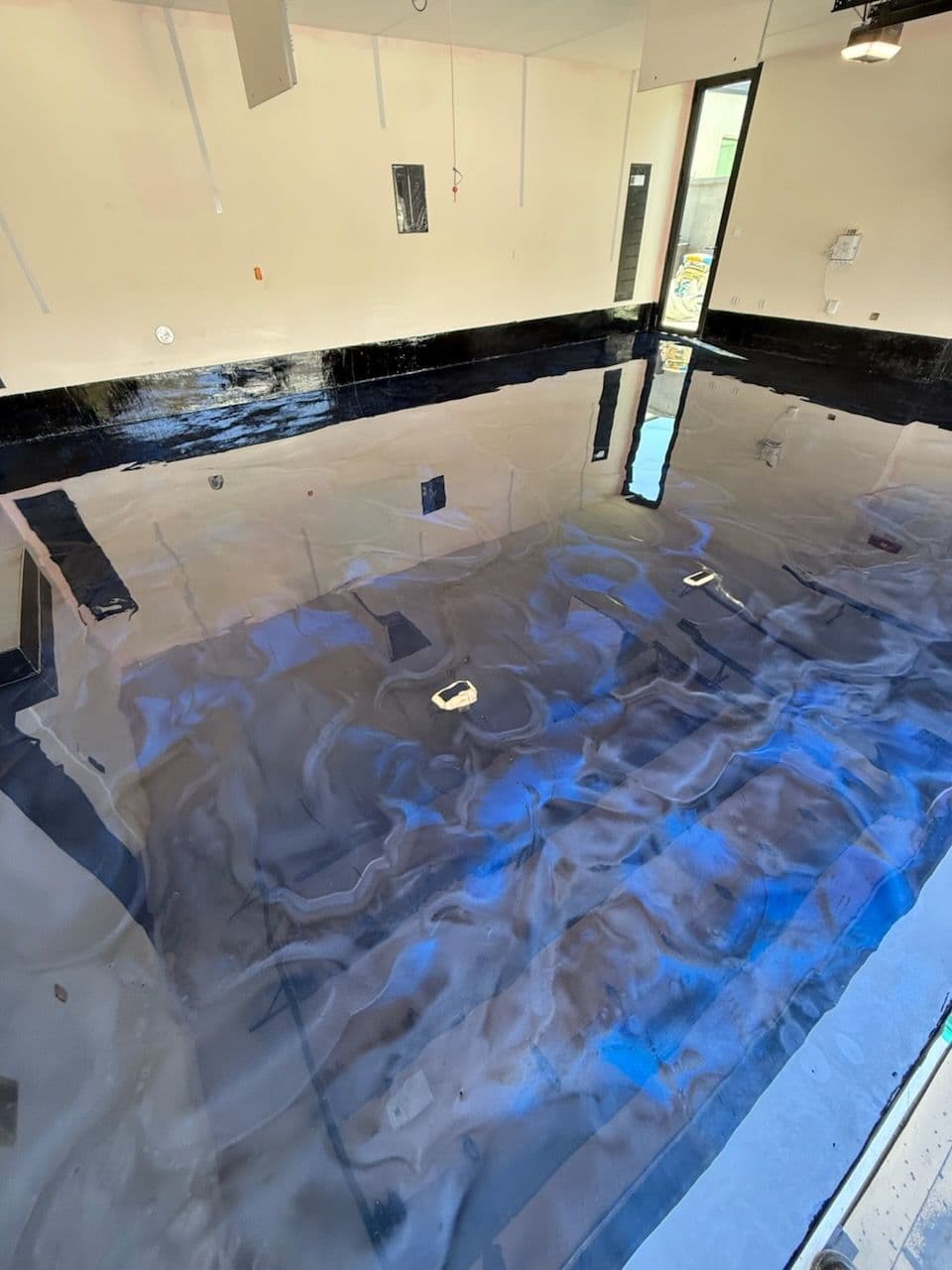 Gallery photos for Dark Blue Metallic Marble Epoxy Garage Floor: Image #1