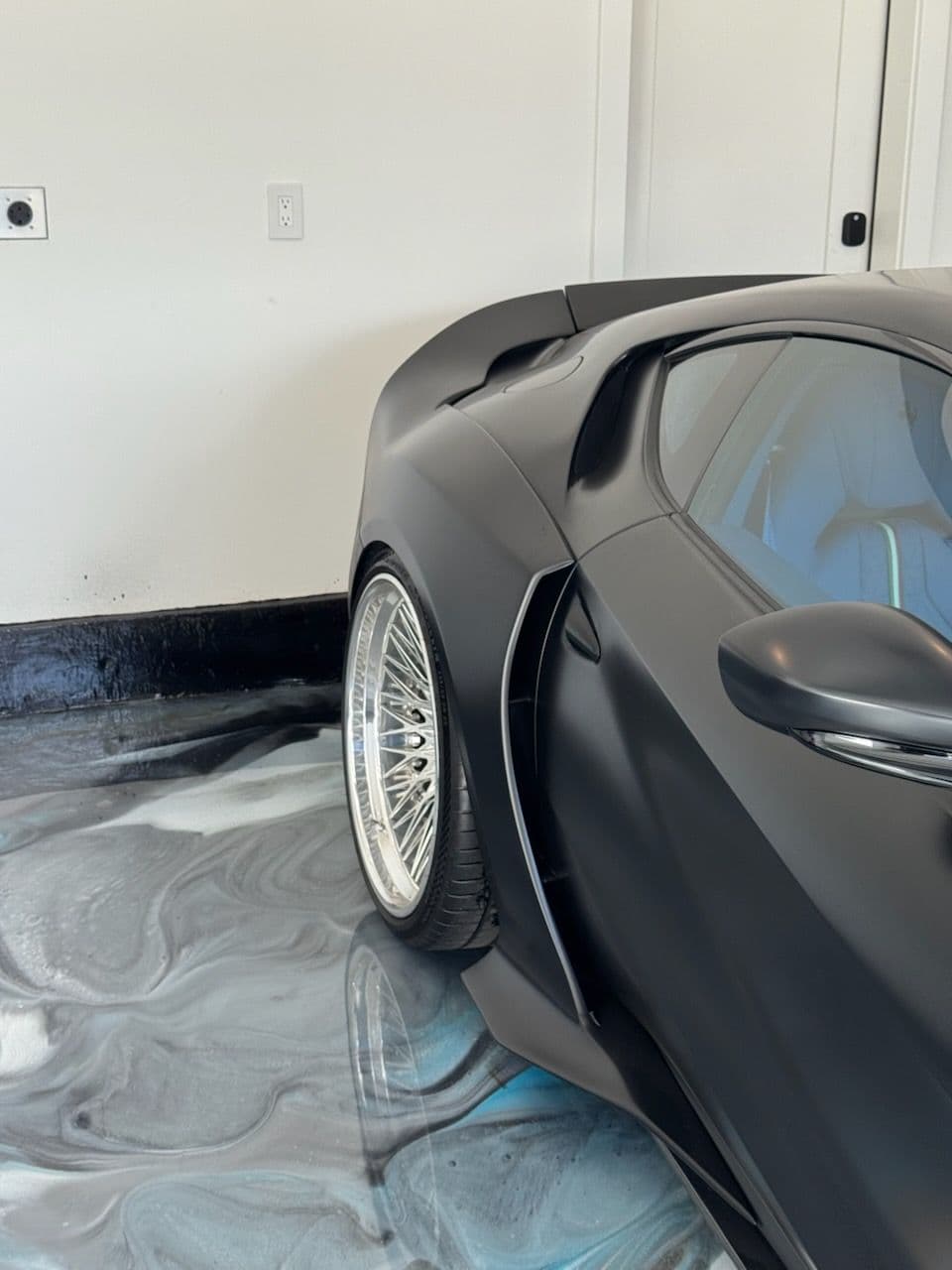 Metallic Epoxy Mastery Highlights Luxury Garage in Huntington Beach