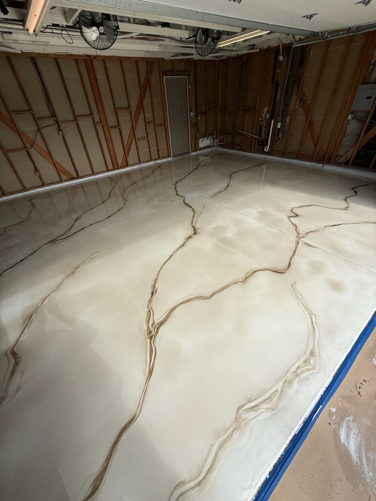 Project Stylish Metallic Epoxy Floor Upgrade in a Two-Car Garage image