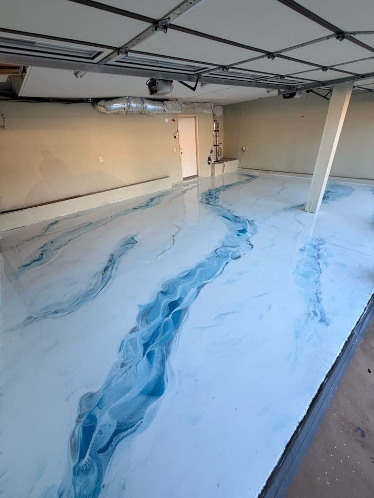 Stunning White and Blue Metallic Epoxy Garage Floor in Newport Beach