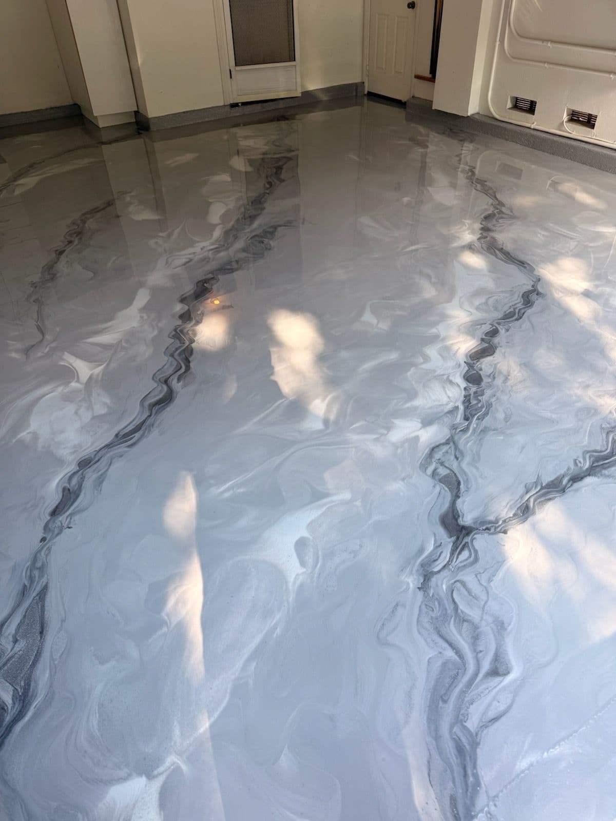 Gray and Black Metallic Epoxy Floor Enhancement in Huntington Beach