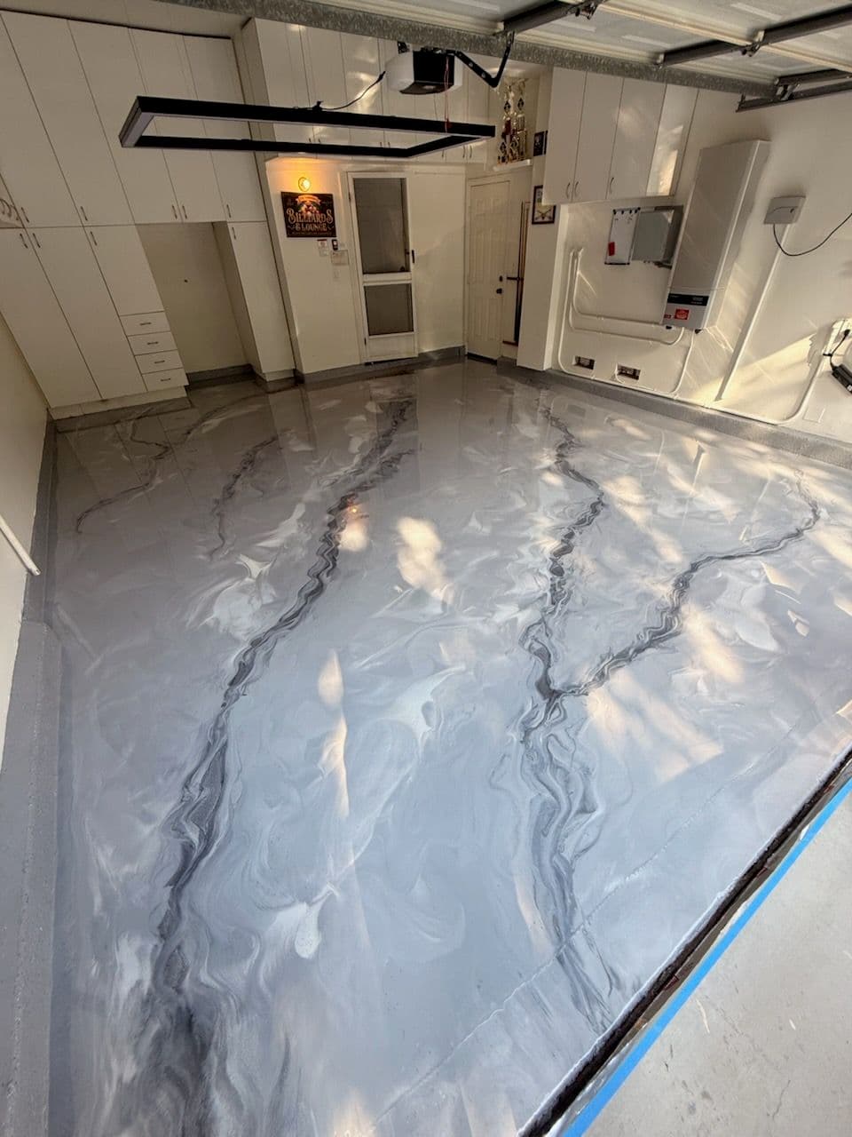 Gallery photos for Gray and Black Metallic Epoxy Floor Enhancement in Huntington Beach: Image #1